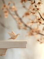 Origami bird and cherry blossoms in a serene and elegant spring arrangement photo