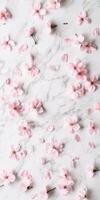 Cherry blossom flat lay on marble background for spring decor and design photo