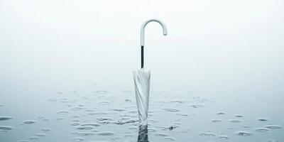 Minimalistic elegance of a folded white umbrella in a serene water scene for modern design photo