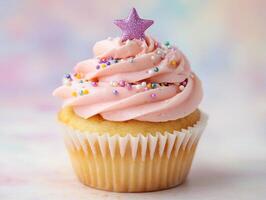 Festive cupcake with pink frosting and star decor for celebrations photo