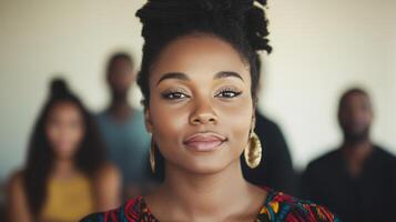 A Confident Woman Poses With Friends Blurred In Background photo
