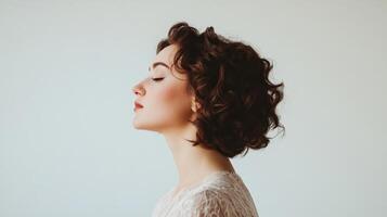 Woman with Short Curly Brown Hair Profile View photo
