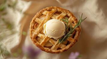 Delicious Apple Pie with Ice Cream and Rosemary photo