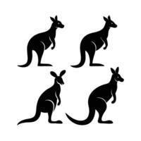 This image features four distinct silhouettes of kangaroos in various poses against a plain white backdrop. vector