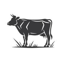A simple, black and white silhouette of a cow grazing in a field of grass. vector