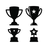 This image features a set of four black and white trophy icons in a flat design. vector
