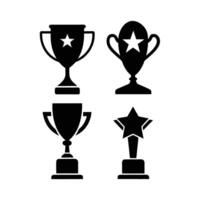 This image features four distinct trophy icons in a solid black silhouette against a plain white background. vector