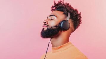 Man with headphones enjoys peaceful audio experience photo