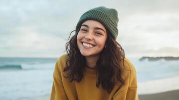 Happy Young Woman Smiling Near Ocean Waves photo