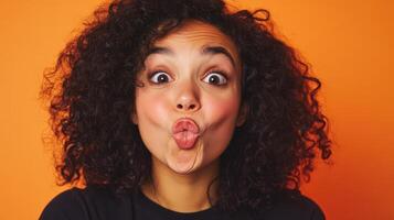 A woman with curly hair making a funny face photo