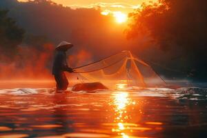 A man in a boat with a net in the water photo