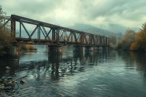 A train bridge over a river photo