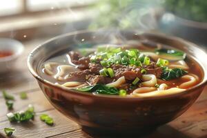 A bowl of noodles and beef in a bowl photo