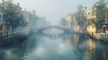 A canal in the fog with a bridge and gondolas photo