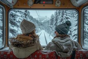 Two women sitting in a train looking out the window photo
