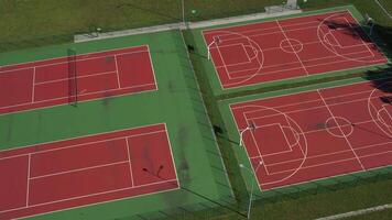 View from the height of the empty Tennis courts in the daytime in summer. video