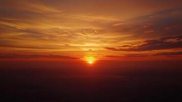 Dramatic Sunrise Over the Horizon with Fiery Sky and Clouds photo