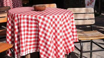 Enjoying a cozy table setting at an outdoor cafe video