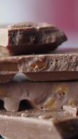 Enjoying rich chocolate bars with caramel pieces on display video
