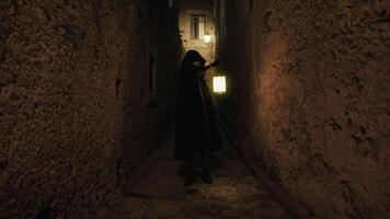 Dark Monk With The Lanter Inside The Ancient Walls video