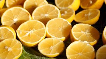Freshly sliced lemons arranged on a table in natural light video