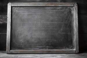 Empty Worn Wooden Framed Blackboard with Chalk Marks on Rustic Dark Wooden Background for Education and Teaching photo