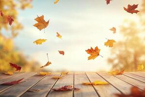 Autumn Maple Leaves Falling Above Wooden Table with Warm Sunlight and Blurry Forest Background photo