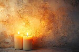 Warm Glow of Lit Candles Against Rustic Textured Background for Relaxation and Calm Ambiance photo