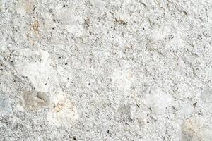 Rough White Stone Textured Surface with Fine Grain Details for Backgrounds and Designs photo