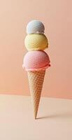 Triple Scoop Ice Cream Cone With Strawberry Vanilla Lemon Scoops On Beige Pink Background For Summer Dessert photo