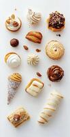 Assorted Gourmet Pastries and Desserts with Cream and Nuts on White Background for Bakery Display photo