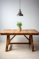 A wooden table with a potted plant on it photo