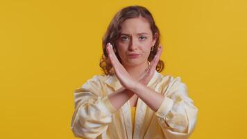Woman say No hold palm folded crossed hands in stop gesture warning of finish prohibited access video