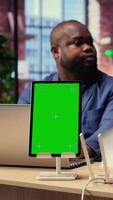 Black man and woman getting angry at home internet next to mockup screen, identifying weak connection and testing different troubleshooting techniques to fix their network errors. Camera B. video