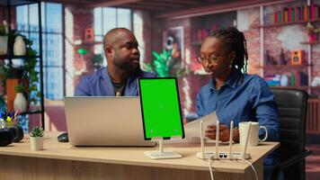Black man and woman getting angry at home internet next to mockup screen, identifying weak connection and testing different troubleshooting techniques to fix their network errors. Camera A. video