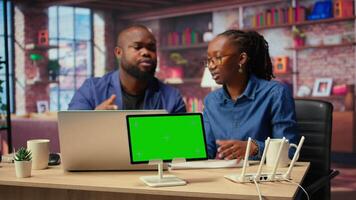 Irritated people trying to fix an ongoing Wi Fi problem by rebooting modem next to copy space, troubleshooting connection errors and testing different network configurations. Camera A. video