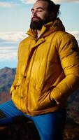 Vertical Determined explorer gazes at the endless sky and towering peaks, reflecting on extreme hiking activity and conquering fears. Enjoys breathtaking mountain view, nature lover. Camera A. video