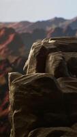 Vertical Panoramic view of a stunning mountain range with rocky terrain in the foreground. Perfect for adventure seekers looking for an extreme hiking experience in the heart of untouched wilderness. video