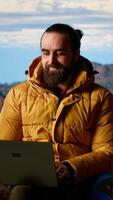 Vertical Young entrepreneur always connected to internet to do some tasks, workaholic person enjoying high speed strong signal and technology dependency. Hiker with an addiction. Camera B. video