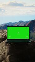 Vertical Captivating mountain escape with a rugged rocky and chroma key in the foreground. This natural beauty spot is ideal for travelers looking to experience an unforgettable wilderness adventure. video