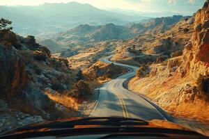 View from the car window onto a deserted mountain serpentine. photo