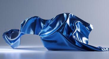 Brightly illuminated blue metallic texture creates a dynamic visual effect with smooth gradient. photo