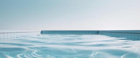 Clear blue swimming pool water with ripples and reflections creating a tranquil aquatic scene Copy Space. photo