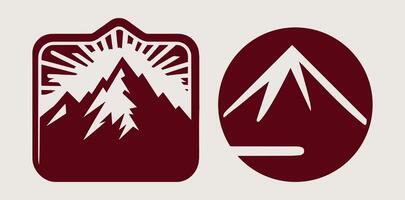 A mountain and a mountain range are shown in a logo vector