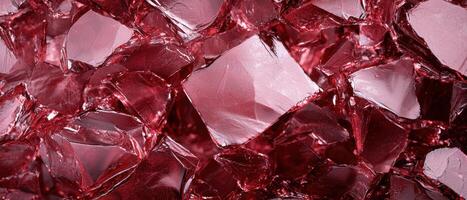 Close up of red glass shards, creating a textured background photo