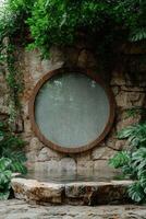 A tranquil stone grotto with a round window and lush greenery photo