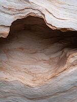 Sandstone cave with layered texture photo