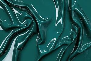 Abstract glossy green liquid background with waves and reflections photo