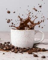 Coffee splash in a speckled mug with coffee beans photo