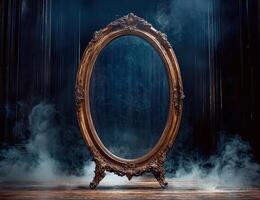 Ornate gold mirror surrounded by smoke on a stage photo
